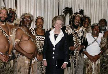 British Prime Minister Margaret Thatcher meets with members of the Zulu leadership including Mangosuthu Buthelezi (centre right), founder of the Inkatha Freedom Party (IFP).