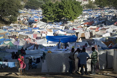 The grounds of the Petionville Golf Club have become a camp for internally displaced persons (IDPs) housing at least 50,000 people after an earthquake hit the country. The clubhouse became quarters fo...