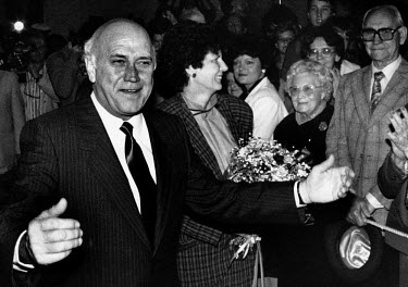 President FW de Klerk arrives back from an overseas trip and is greeted by well wishers.