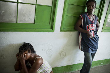 A man and his sister mourning the loss of their mother in Chancerelle hospital, where Medecins Sans Frontieres (MSF) are treating people injured when an earthquake hit the country. A 7.0 magnitude ear...