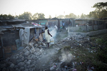 A camp for internally displaced persons (IDPs) in the main square of Leogane, near the epicentre of the earthquake that struck fifteen days earlier. A 7.0 magnitude earthquake struck Haiti on 12/01/20...