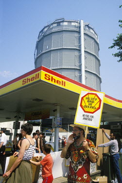 Anti apartheid demonstration at a petrol station in New York calling for Shell to disinvest from South Africa and Namibia.