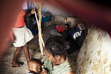 People displaced by the earthquake living in a camp in Port-au-Prince. A 7.0 magnitude earthquake struck Haiti on 12/01/2010. Early reports indicated that more than 100,000 may have been killed and th...