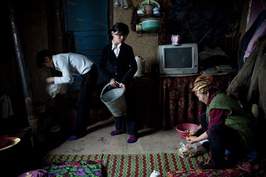 Poor migrant family from the provinces now living on the outskirts of Bishkek.