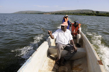 Scientists from the Fisheries Research Intitute on Lake Victoria at Jinja on a research trip. The lake is under serious threat from climate change, with lake levels dropping, causing marginal and shal...