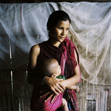 25 year old Ginba Chawa is a Karen living in Thailand. Her five children have all contracted malaria at least once and one of them has contracted it four times. According to a local malaria specialist...