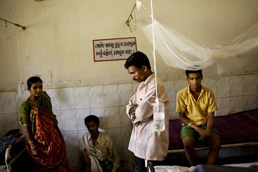 Malaria patients and their families in a clinic in Orissa state.