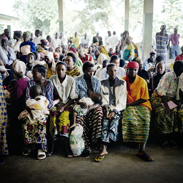 In a hospital in Bujumbura, people wait to see a doctor. Most of them come because of malaria.