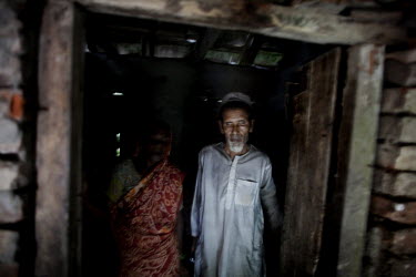 A displaced man and woman, 60 year old Mohammed Sabir Ali Gazis and 50 year old Sokina Khatun live in a small room in the town of Satkhira. They fled an island when the flood barriers broke and the wa...
