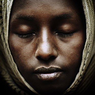 A Somali woman at a refugee camp in Dadaab. From the neighbouring country of Somalia an estimated 8000 refugees cross the border each month to escape the desperate living conditions.