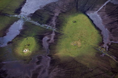 A small habitation on the wetlands of Lake Bangweulu seen from the air.