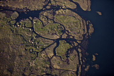 Small habitations beside Lake Bangweulu seen from the air.