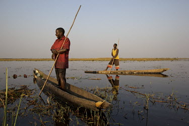 Fishermen use dugout canoes to travel around Lake Bangweulu.
