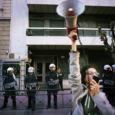 A woman from the Communist Party of Greece (KKE) shouting slogans during a demonstration in the midst of the financial crisis.