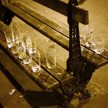 Empty beer glasses on a bench outside The Crown Tavern, a pub in the City of London. Due to the ban on smoking in public buildings, pub patrons are increasingly using the pavements outside of pubs to...