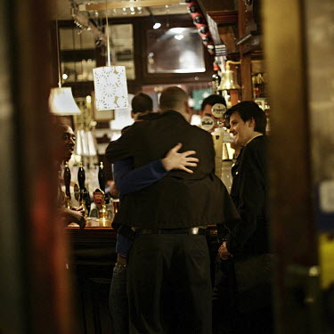 Patrons in The Crown Tavern, a pub in the City of London