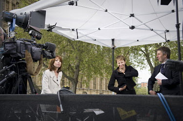 Caroline Lucas, Britain's first Green Party MP, prepares to be interviewed for Sky News outside the Houses of Parliament on College Green in Westminster, London.
