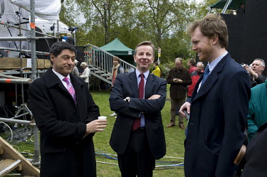 Conservative MP and new Secretary of State for Education, Michael Gove (centre) and BBC reporter Jon Sopel (left) on College Green in Westminster, London.