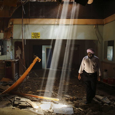 Baldes Lohia, a Sikh community leader in London, inspects the conversion work transforming The Ship Aground pub into a Sikh temple. The pub's losses made it commercially unviable and it was sold off b...