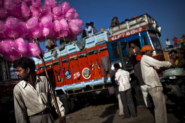 A man sells candy floss at the Hola Mohalla Festival. It takes place on the first day of the lunar month of Chet (March/April).