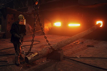 A worker smelts copper at a plant in Norilsk, a resource-rich city in Siberia above the Arctic Circle.