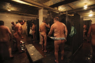 Workers wash themselves in the showers after a shift at a copper plant in Norilsk, a resource-rich city in Siberia above the Arctic Circle.