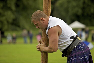 Neil Elliott competes in the World Championships for caber tossing, the hardest of the heavy events at the Inveraray Highland Games, held at Inveraray Castle in Argyll.