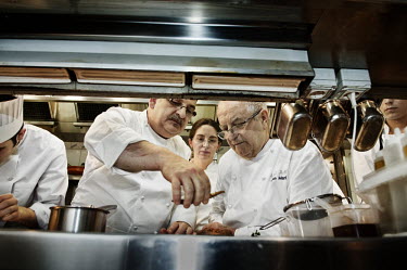 Chef Juan Mari Arzak (right) teaches students in the kitcken at Arzak Restaurant in San Sebastian.
