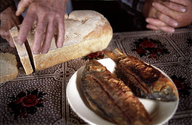 Bread and fried fish, the main meal of the day in Ceatalchioi village.