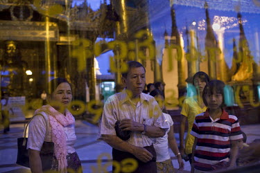 Devotees visit Shwedagon Pagoda in Yangon (Rangoon).