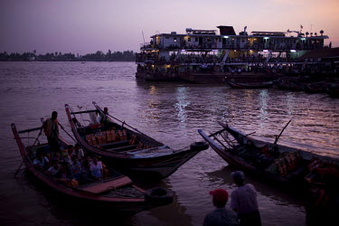 A passenger ferry departs from the docks in Rangoon (Yangon).