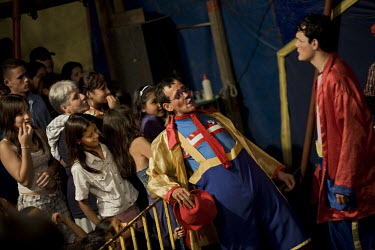 Fredy and Gustavo during their clown routine at a crowded Sombrillita Circus. Around a dozen small circuses wander the poorer neighbourhoods near and around the city of Medellin putting on performance...
