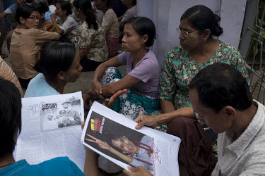 National League of Democracy supporters read newspapers showing Aung San Suu Kyi the day after her release from house arrest in Rangoon. From 1990 until her release on 13 November 2010, Aung San Suu K...