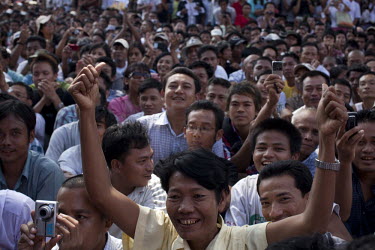 Supporters of Myanmar's newly-released opposition leader Aung San Suu Kyi react as they listen to her speak at the National League for Democracy (NLD) headquarters in Rangoon. From 1990 until her rele...