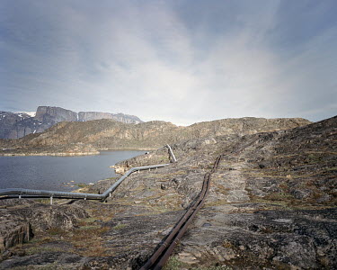 Water and electricity pipes run along the ground. Pipes are not allowed to be buried underground on Greenland.
