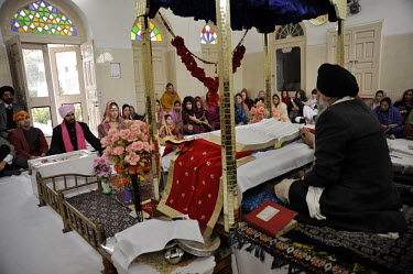 The wedding ceremony of British/Punjabi couple Lindsay and Navneet Singh at a gurdwara in Amritsar.