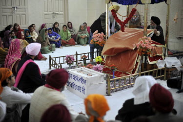 The wedding ceremony of British/Punjabi couple Lindsay and Navneet Singh at a gurdwara in Amritsar.