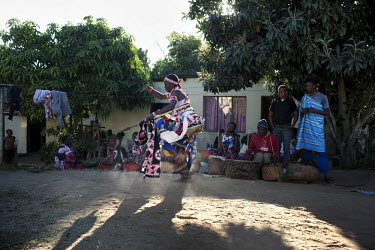 A sangoma dances during an initiation ceremony. The initiates had 6 months of intense training - learning about traditional herbal medicine, divination, counseling and performing humbling service in t...