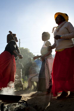 Sangomas dance around the fire during initiation of other sangomas. Sangomas are an essential thread in the rich cultural fabric of South Africa. Traditional healing has a long history in Africa, with...