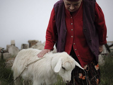 Edaviye takes care of her goats in Nikita, an unofficial Tatar community.
