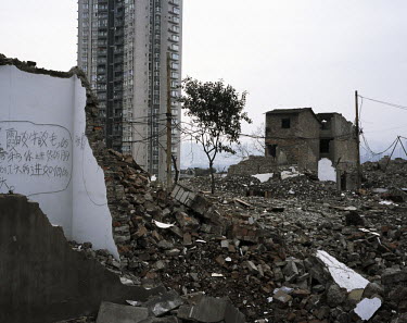 Building ruins near an apartment block in Chongqing.