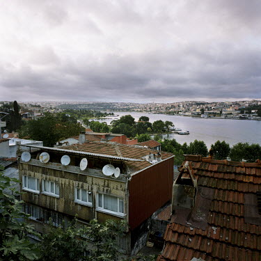 Satellite dishes on old buildings in the old part of the city by the Golden Horn.