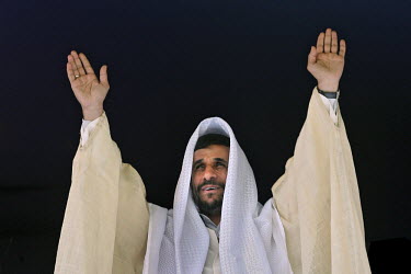 Iranian President Mahmoud Ahmadinejad waves to ethnic Arab supporters in the city of Susangerd in the coastal province of Khuzestan, dressed in traditional Arab clothing. As a way of attracting the nu...