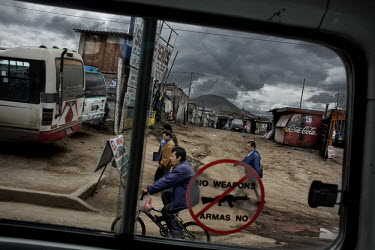 A street scene in the Soacha neighbourhood of Bogota, viewed from a bus. There are between 500,000 and 800,000 registered IDPs (Internally Displaced Persons) in Bogota, but there are many more who are...