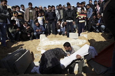 The funeral of Salama Abu Hashish, 19, takes place in Beit Lahiya, northern Gaza. Abu Hashish was shot by an Israeli sniper while grazing animals near the northern border. Due to the buffer zone appro...