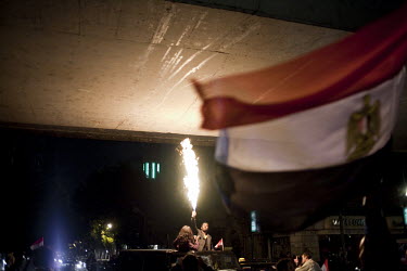 Residents of the middle class neighbourhood of Zamalek celebrated wildly under the 26th of July bridge. 25 January 2011 saw the beginning of a non-violent 18 day protest movement that eventually ended...