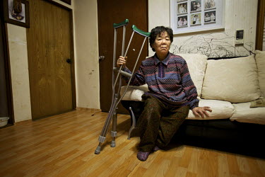 76 year old Kim Auk Ja had most of her left hip blown off when she slipped and fell down a bank in a forest and on to a mine outside the heavily mined village of Haean near the DMZ (Demilitarised Zone...