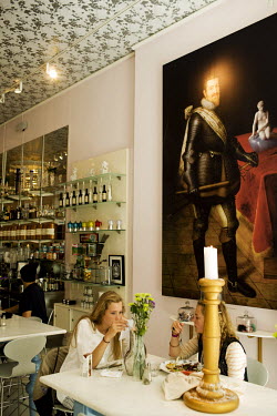 Two women eat at thhe Royal Cafe, Amagertorv.