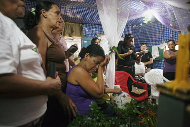 34 year old Marlene, from Honduras, speaks at the funeral of her husband who was murdered by the criminal cartel, Zetas, along with 71 other migrants in Tamaulipas, Mexico, in August 2010. According t...
