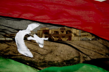 Tobruk seen through the flag that has become the symbol of 'the new Libya'. In fact the flag goes all the way back to when Libya was a kingdom. On 17 February the country saw the beginnings of a revol...
